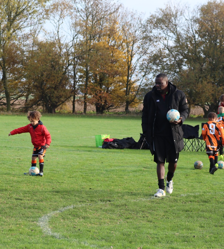 Mutani Yangwe coaching grassroots football